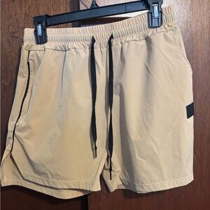 Light Beige Athletic Shorts with Elastic Waistband and Drawstring